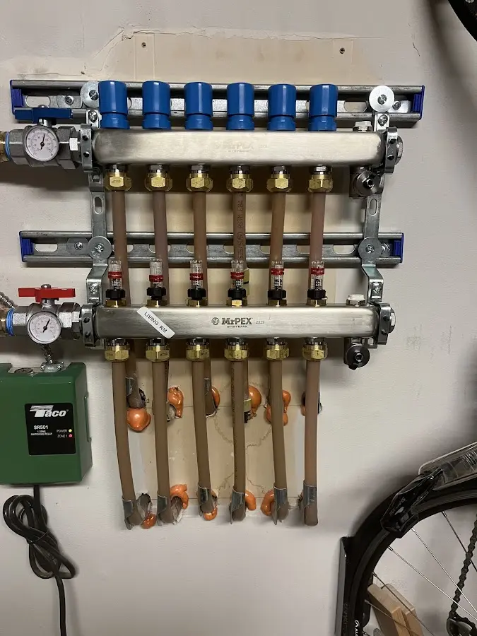 Plumber performing Water Heater Repair at a residential property in Weston